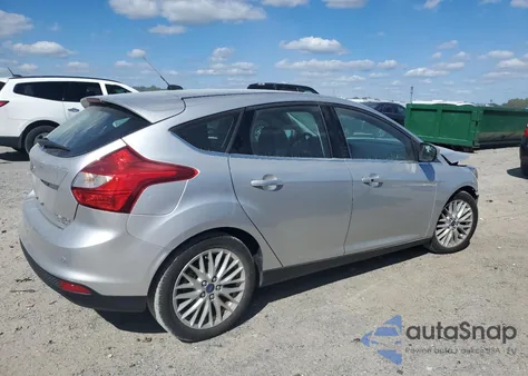 2013 Ford Focus Titanium z USA, uszkodzony, nr VIN 1FADP3N29DL194031